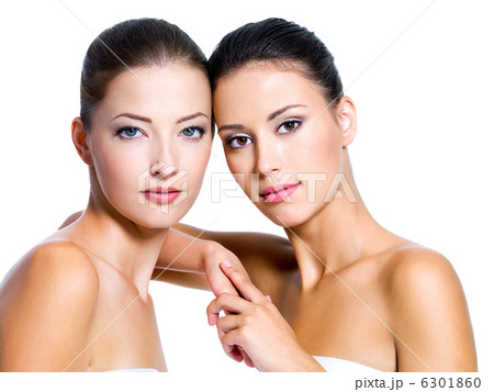 Portrait of two beautiful  women on white 6301860