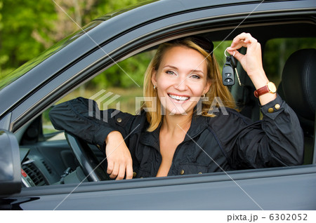 woman shows keys from the car woman shows keys from the car 6302052