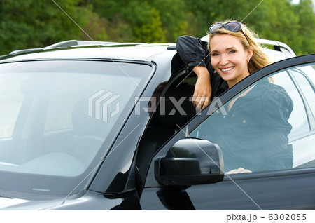 Happy woman in the new car Happy woman in the new car 6302055
