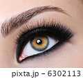 Female eye with black long eyelashes 6302113