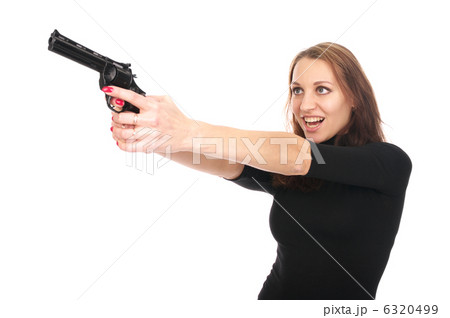 Cute woman with a gun 6320499
