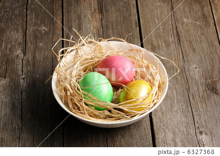 Colored easter eggs in nest Colored easter eggs in nest 6327368