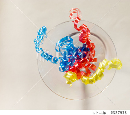 Streamers in a glass of martini Streamers in a glass of martini 6327938