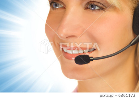 Beautiful hotline operator with headset Beautiful hotline operator with headset 6361172