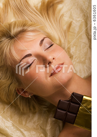 Beautiful girl eats chocolate 6361605