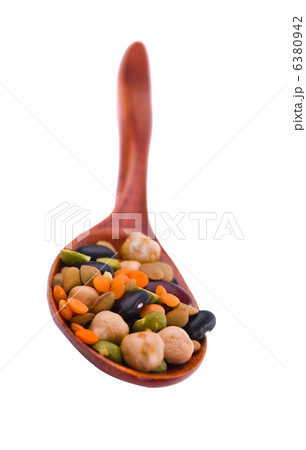 collection of beans, legumes, peas, lentils on wooden spoons 6380942