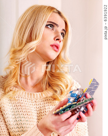 Woman having pills and tablets. Woman having pills and tablets. 6391922