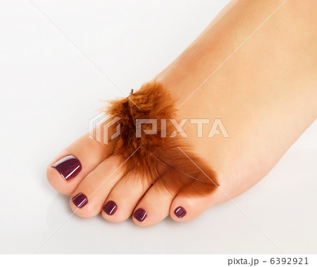 female foot with beautiful pedicure after spa procedure 6392921