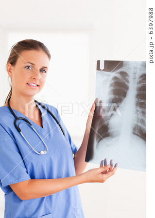 Gorgeous brunette doctor with stethoscope and x-ray Gorgeous brunette doctor with stethoscope and x-ray 6397988