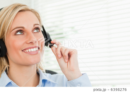 Smiling businesswoman with headset Smiling businesswoman with headset 6398276