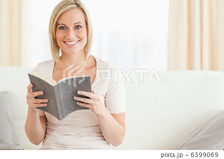 Fair-haired woman with a book 6399069