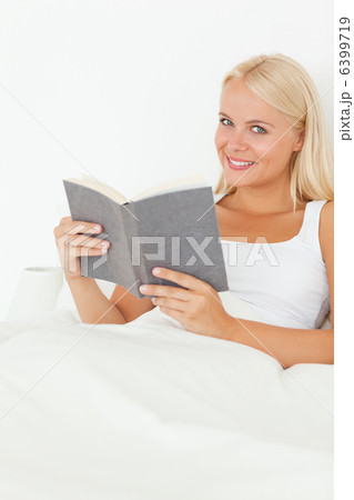 Portrait of a woman with a book 6399719