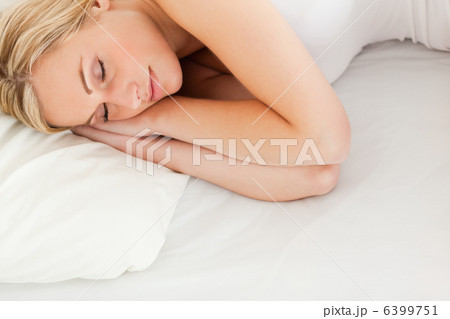 Calm blonde woman sleeping 6399751