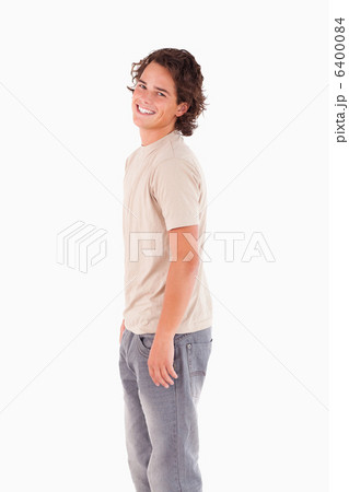 Smiling man looking into the camera Smiling man looking into the camera 6400084