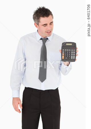 Accountant looking at a calculator 6401706