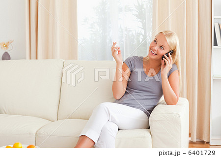 Smiling woman on the phone 6401729