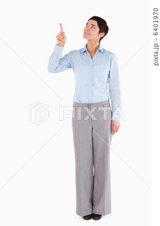 Businesswoman pointing at copy space Businesswoman pointing at copy space 6401970