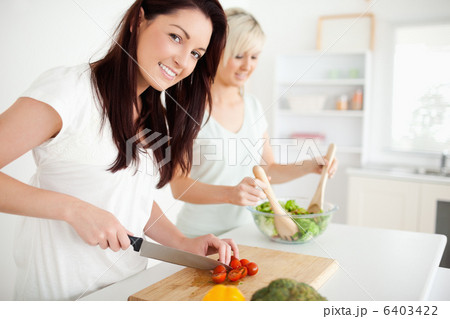 Gorgeous young Women preparing dinner 6403422