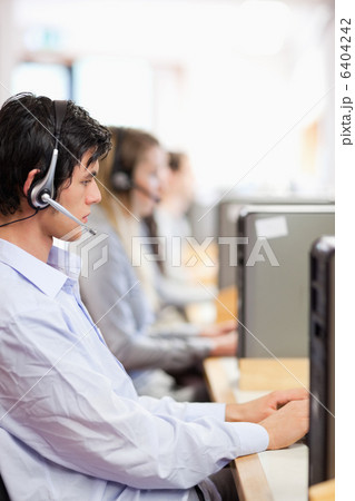 Portrait of young operators using a computer 6404242