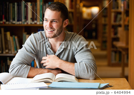 Smiling male student working 6404994