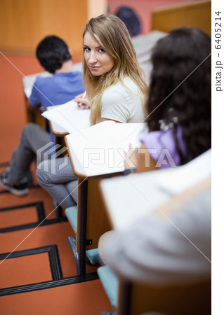 Portrait of a young student being distracted Portrait of a young student being distracted 6405214
