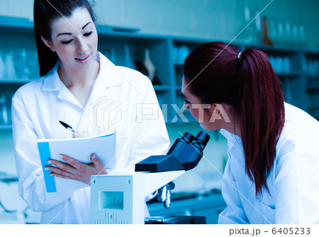 Lab partners discussing about their results 6405233