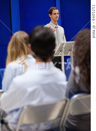 Portrait of a young man doing a presentation Portrait of a young man doing a presentation 6405251