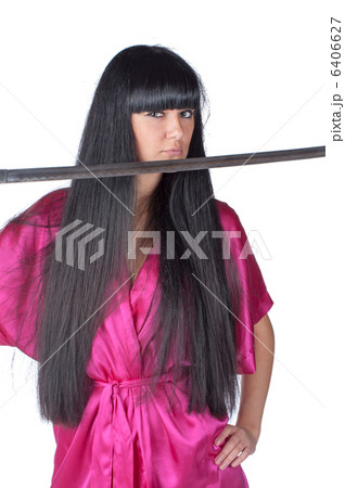 Woman Holding Traditional Japanese Sword Woman Holding Traditional Japanese Sword 6406627