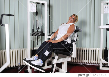 Mature  woman work out in fitness 6428306