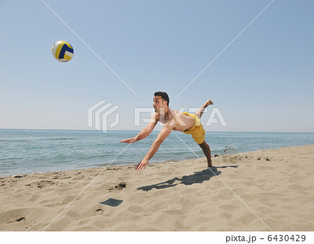 male beach volleyball game player male beach volleyball game player 6430429