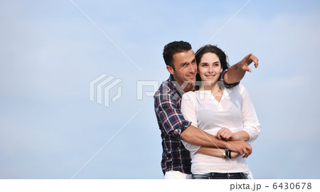 happy young couple have fun on beach happy young couple have fun on beach 6430678