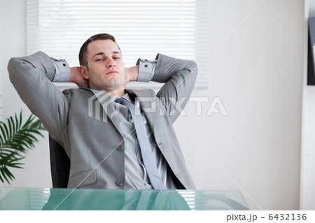 Young businessman taking a small break Young businessman taking a small break 6432136