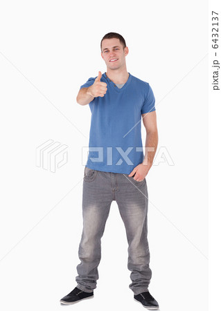 Portrait of a man with the thumb up Portrait of a man with the thumb up 6432137