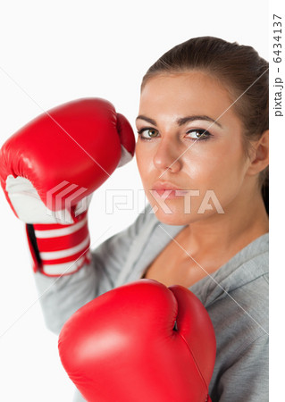 Portrait of a cute woman with boxing gloves 6434137