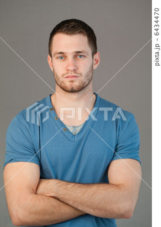 Male with arms folded Male with arms folded 6434470