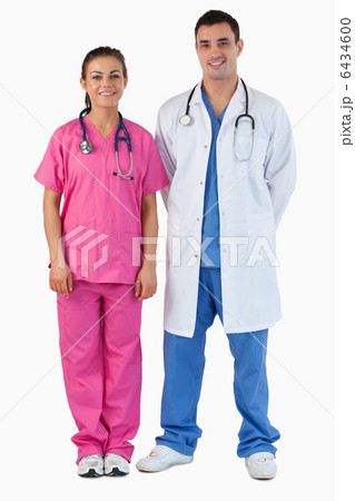 Portrait of a doctor and a nurse standing up 6434600