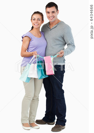 Young couple with their shopping Young couple with their shopping 6434666