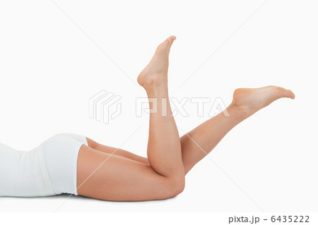 Feminine body lying on her belly Feminine body lying on her belly 6435222