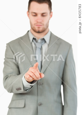 Businessman using futuristic touchscreen 6435783