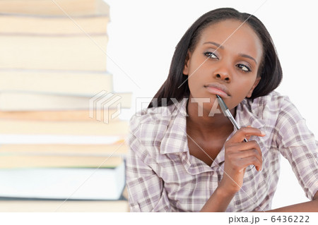 Thoughtful student working 6436222