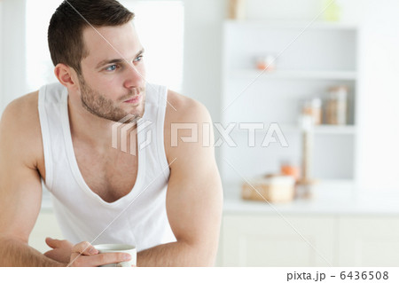 Young man having breakfast Young man having breakfast 6436508