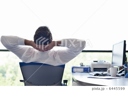 happy young business man at office happy young business man at office 6445599