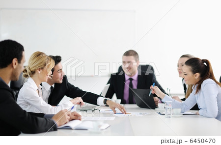 Group of young business people at meeting 6450470