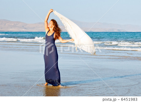 Young woman on the beach 6451983