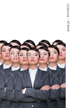 Many identical businesswomen clones. Businesswoman production co Many identical businesswomen clones. Businesswoman production co 6459955