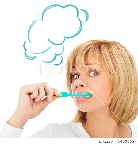 Detail portrait of a happy and wondered mature woman brushing he Detail portrait of a happy and wondered mature woman brushing he 6460058
