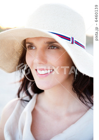 Summer portrait of beautiful woman wearing hat. Vacation at warm 6460139