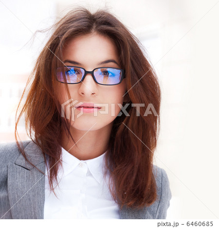 A beautiful young business woman holding her tablet personal com A beautiful young business woman holding her tablet personal com 6460685
