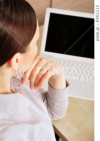 Portrait of a beautiful young businesswoman looking at the scree Portrait of a beautiful young businesswoman looking at the scree 6461215