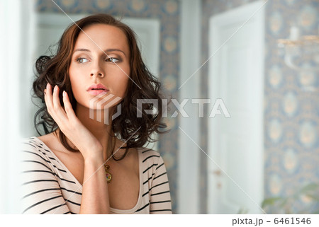 Beautiful woman standing near window. Beauty fashion portrait Beautiful woman standing near window. Beauty fashion portrait 6461546